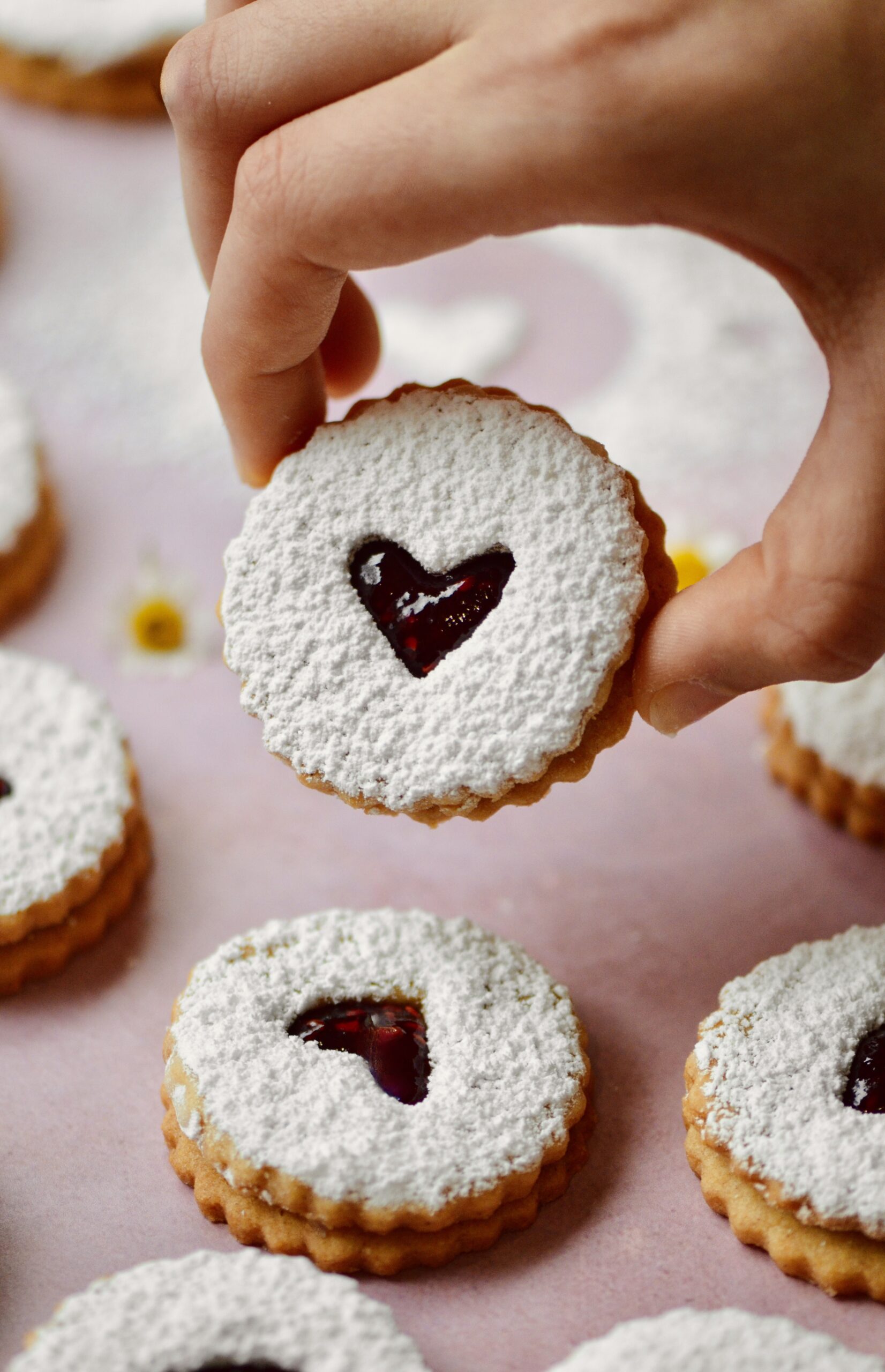 Raspberry Almond Linzer Cookies.
